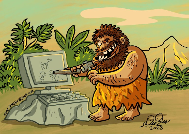 Cartoon of a prehistoric caveman chiseling a stone computer with a primitive tool