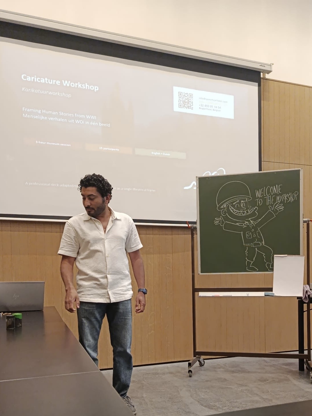 Caricature workshop Buggenhout opening with Sameh Samir teaching cartoon drawing