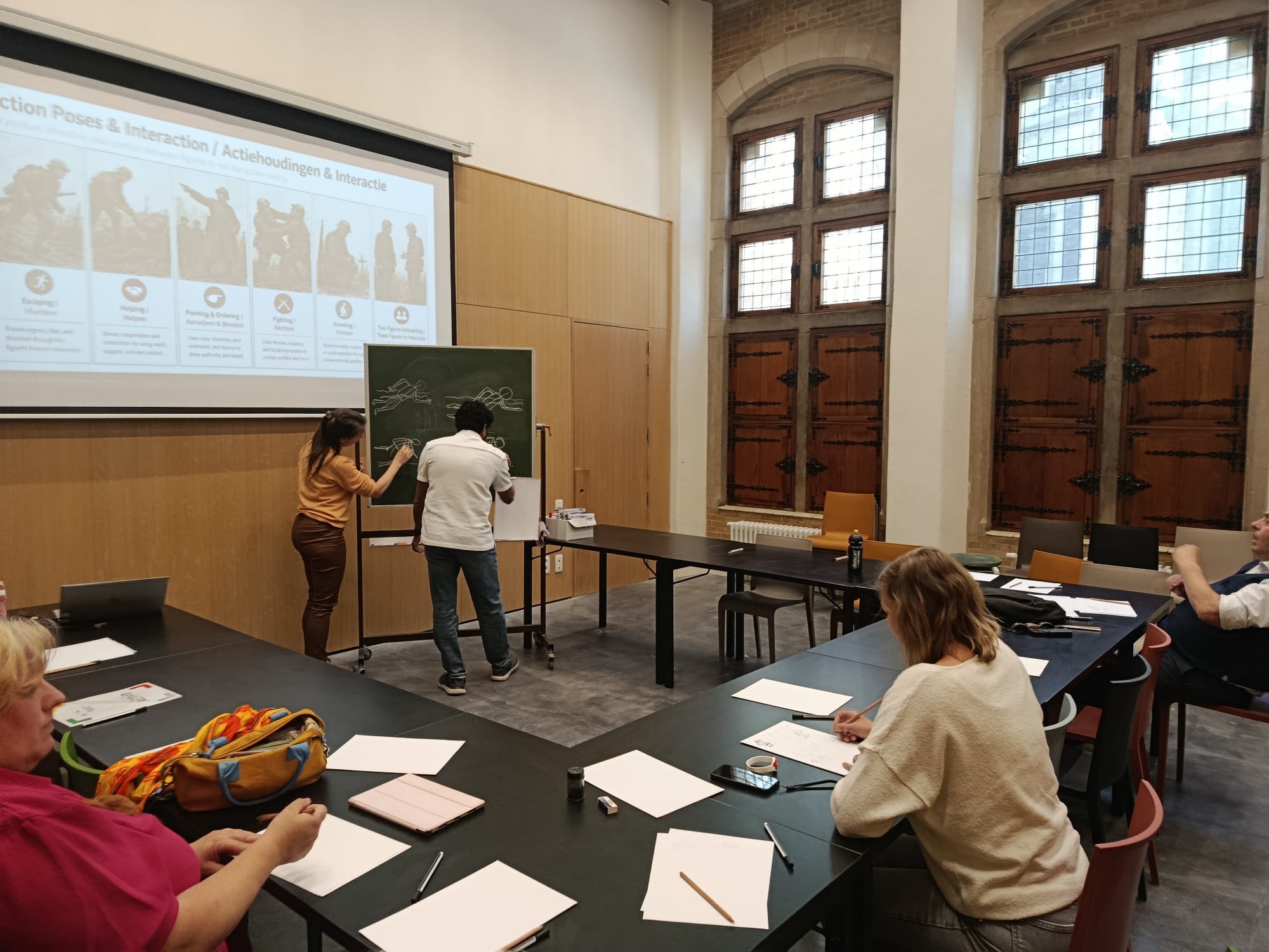 Participants in drawing workshop with Sameh Samir in Belgium